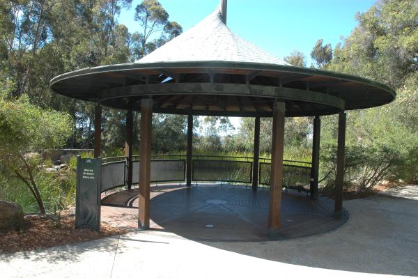 Water Garden Pavilion is positioned on the edge of a small stream.