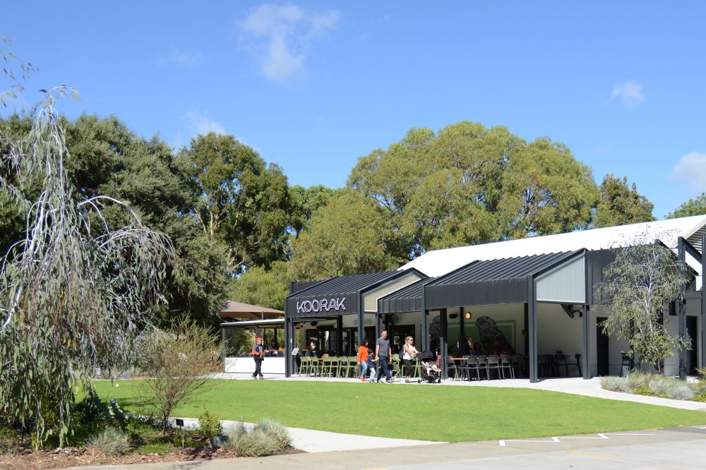 Poolgarla Family Area featuring Koorak Cafe, lawn, playground and plenty of trees.