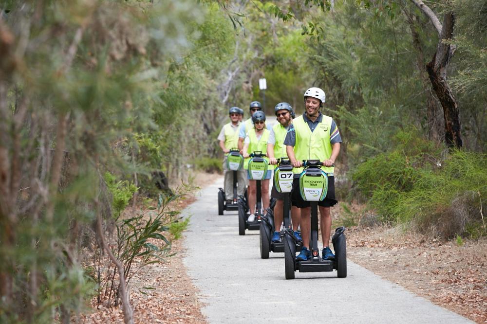 Segway Tours WA group travelling down a bushland path