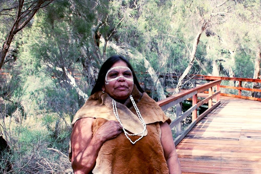 Kerrie-Ann Winmar of Nyungar Tours in traditional Aboriginal dress