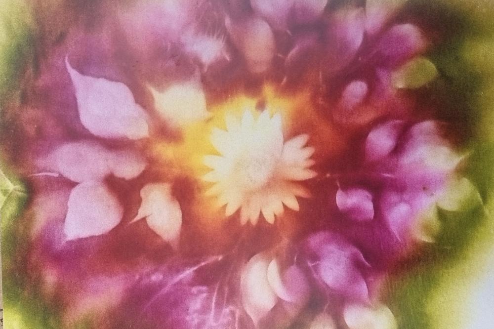 Flower dyed into fabric.