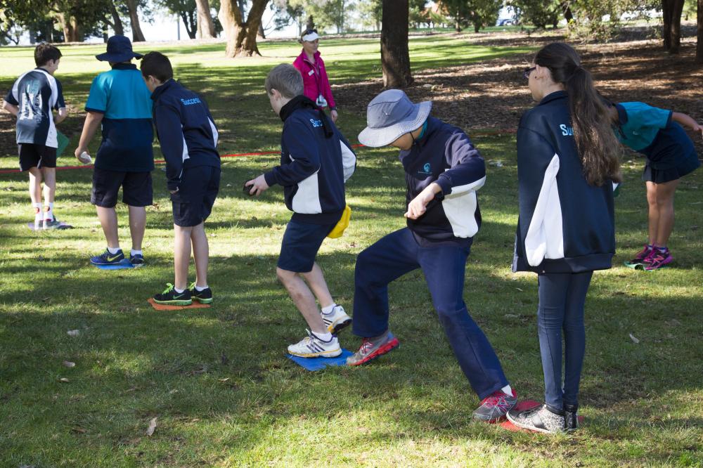 School children take part in team building.