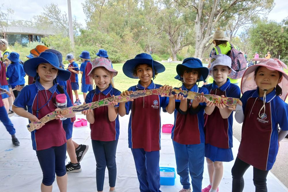 Students do tree wrap activity as part of Noongar Boodja's 2024 Birak Festival
