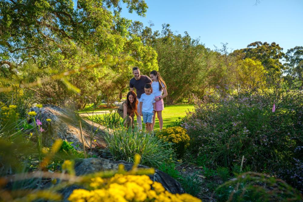 Family at the WA Botanic Garden entrance beds