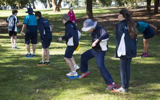 School children take part in team building.