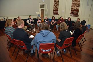 People sitting in a circle.